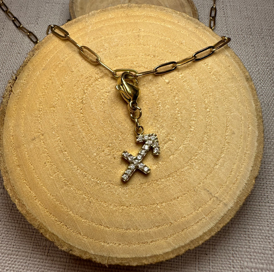 Signe astro doré strass Alaïa Bijoux