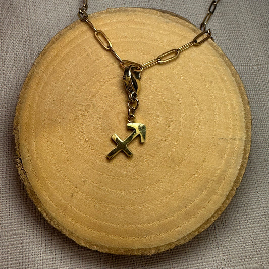 Signe astro doré Alaïa Bijoux