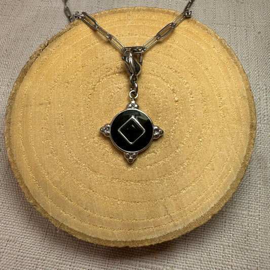 Medaillon perle noir moyenne Alaïa Bijoux